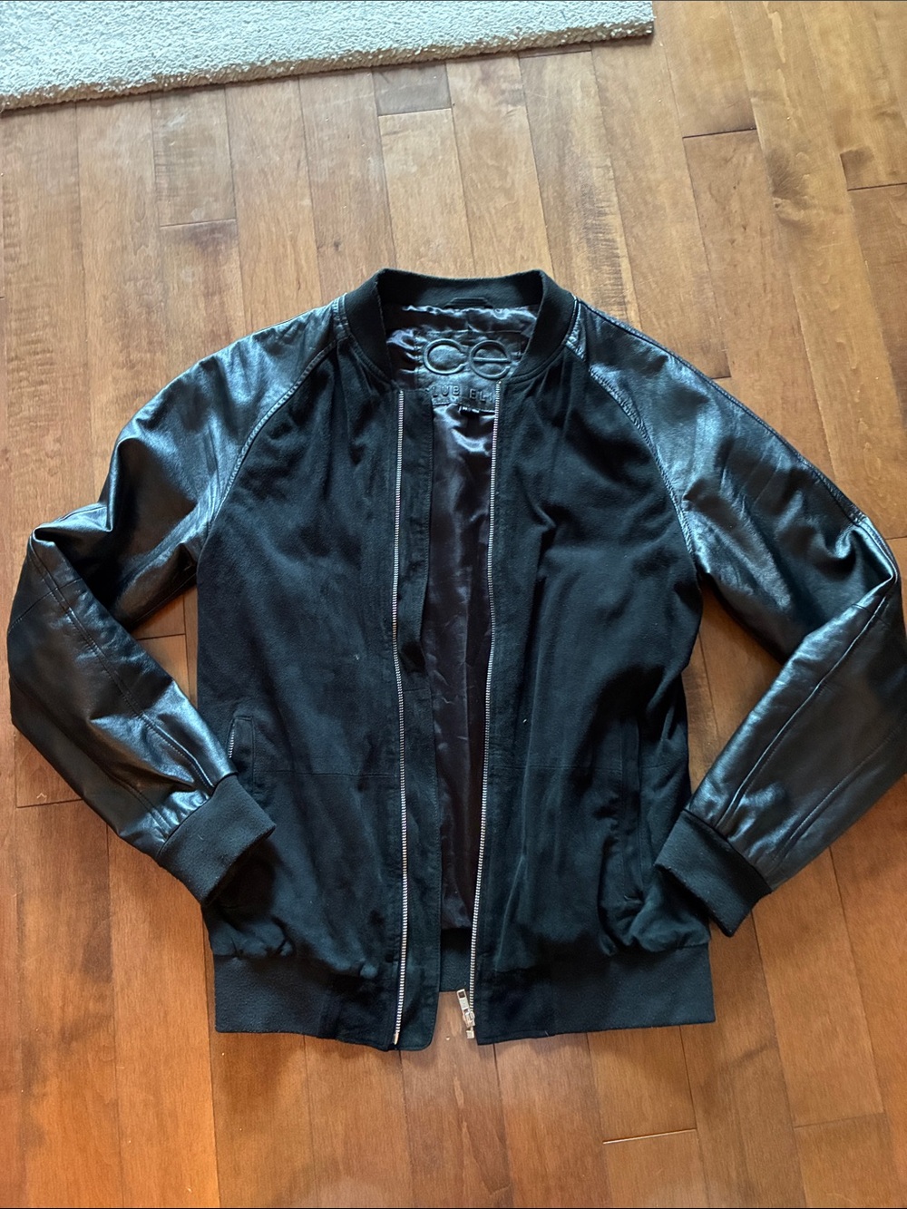Black Mixed-Media Bomber Jacket with Leather Sleeves